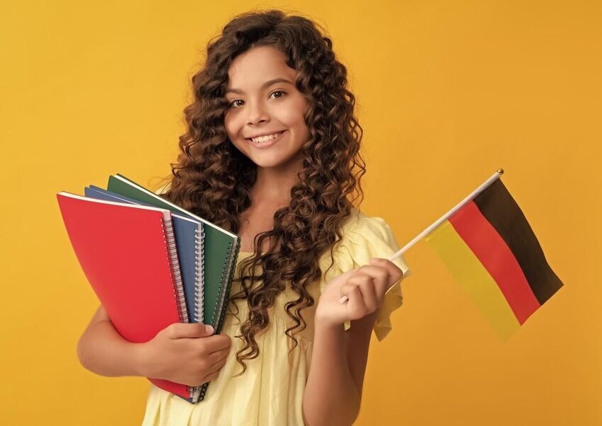 german-language-child-hold-flag-back-school-teen-girl-study-germany-portrait-schoolgirl-student-studio-banner-header-school-child-face-copyspace_545934-52424 german-language-child-hold-flag-back-school-teen-girl-study-germany-portrait-schoolgirl-student-studio-banner-header-school-child-face-copyspace_545934-52424